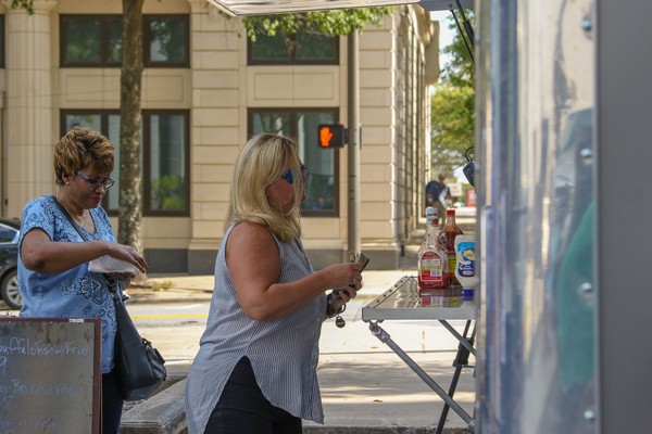 woman orders at Main Street Food Truck Friday